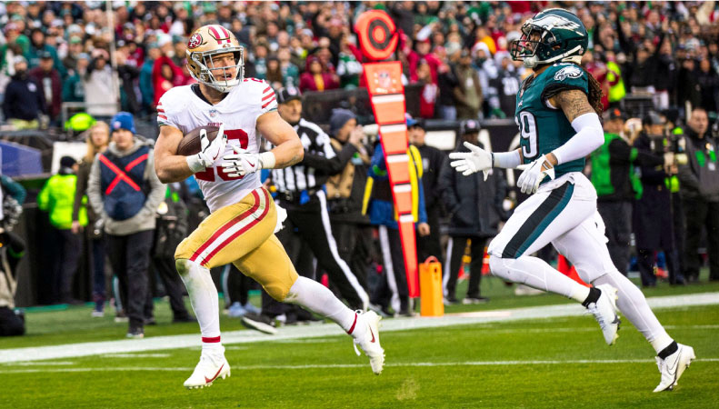 A member of the San Francisco 49ers runs with the ball during a game against the Philadelphia Eagles.