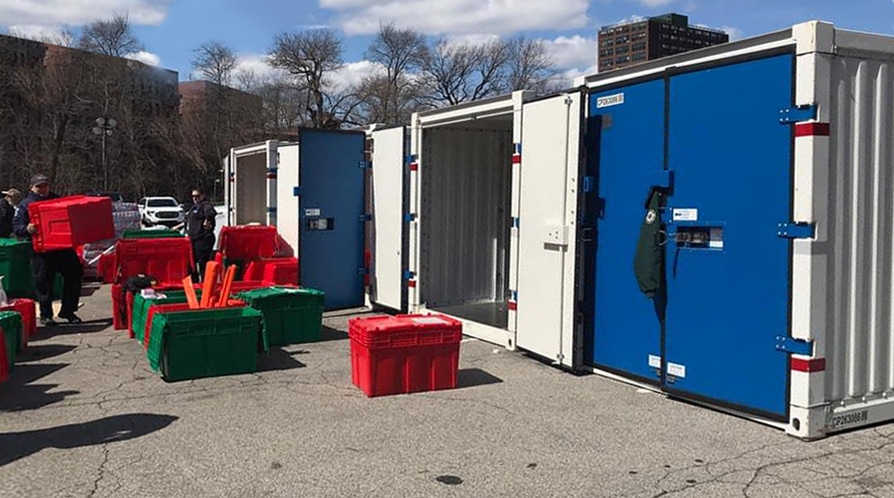 PODS commercial containers in a hospital parking lot