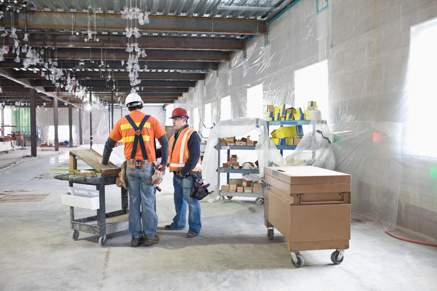 Subcontractors working inside building