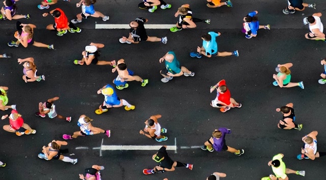 An aerial view of several marathon  runners at a charity walk 