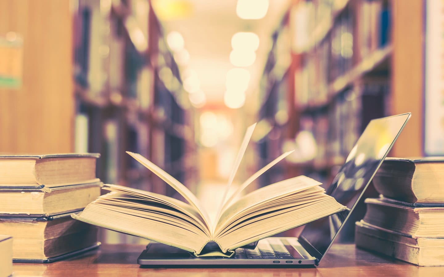 Books and laptop in a college bookstore