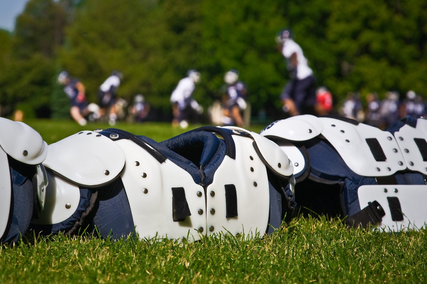 Football gear on a high school football field