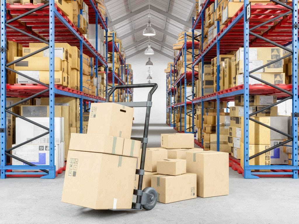 A warehouse and trolly loaded with packages