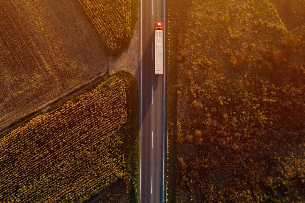 An ftl truck driving on a road