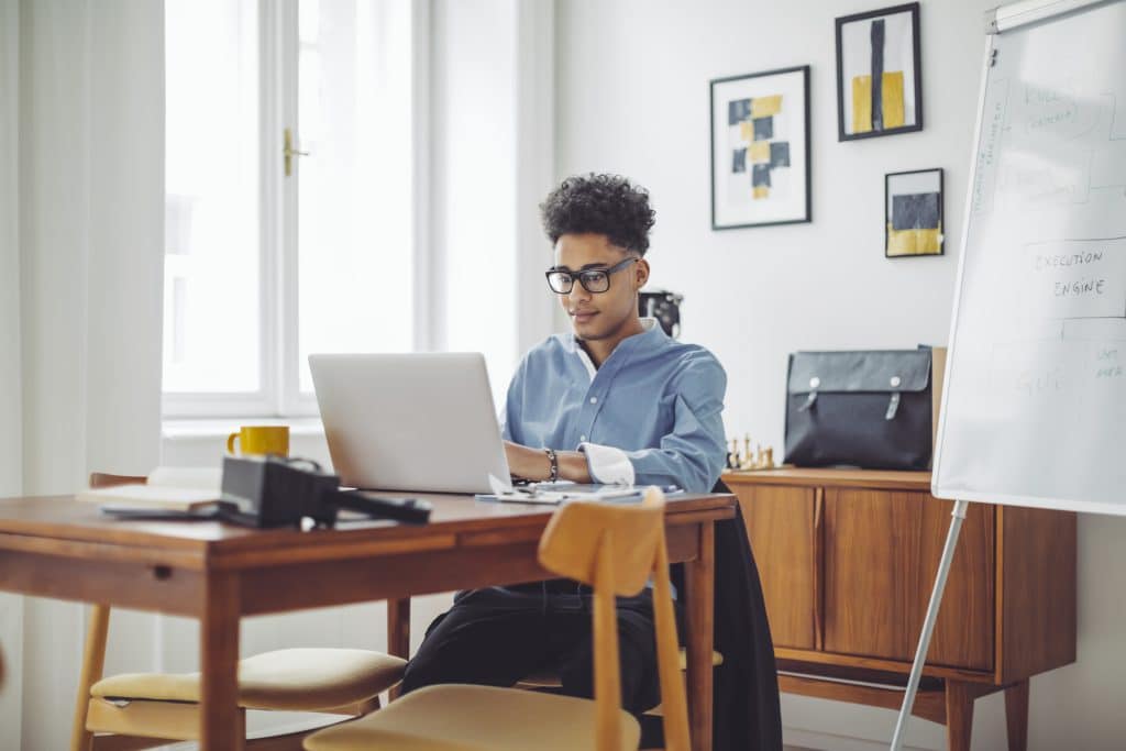 Gen Z male working inside an office