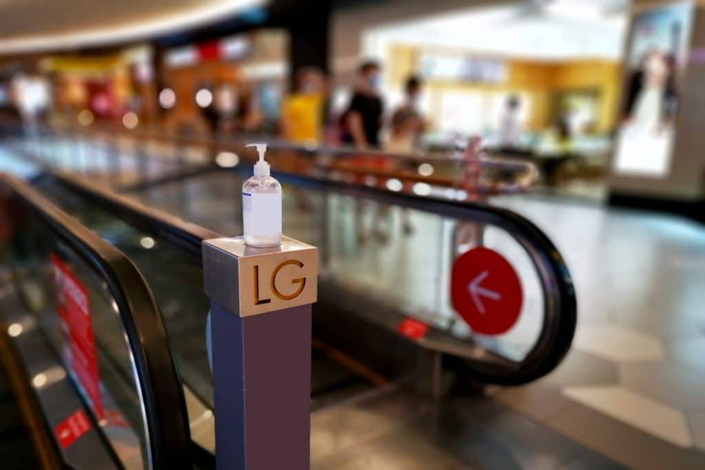 Hand sanitizer bottle in a shopping center