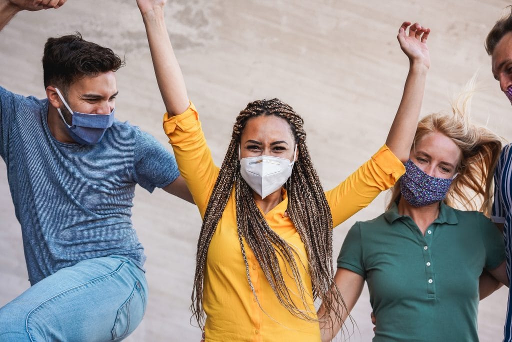 Group of young adults wearing face masks 