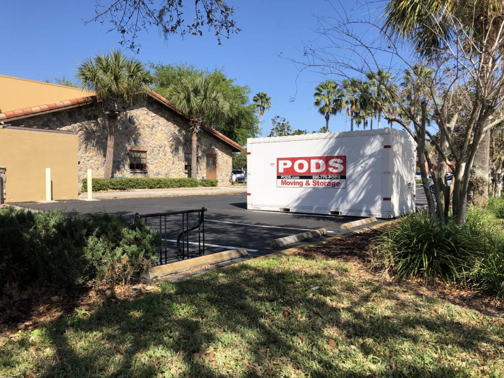 PODS shipping container in a restaurant parking lot