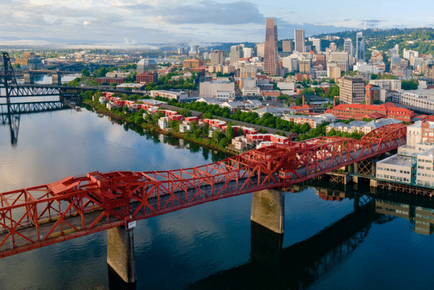 View of bridge over river in the city of Portland