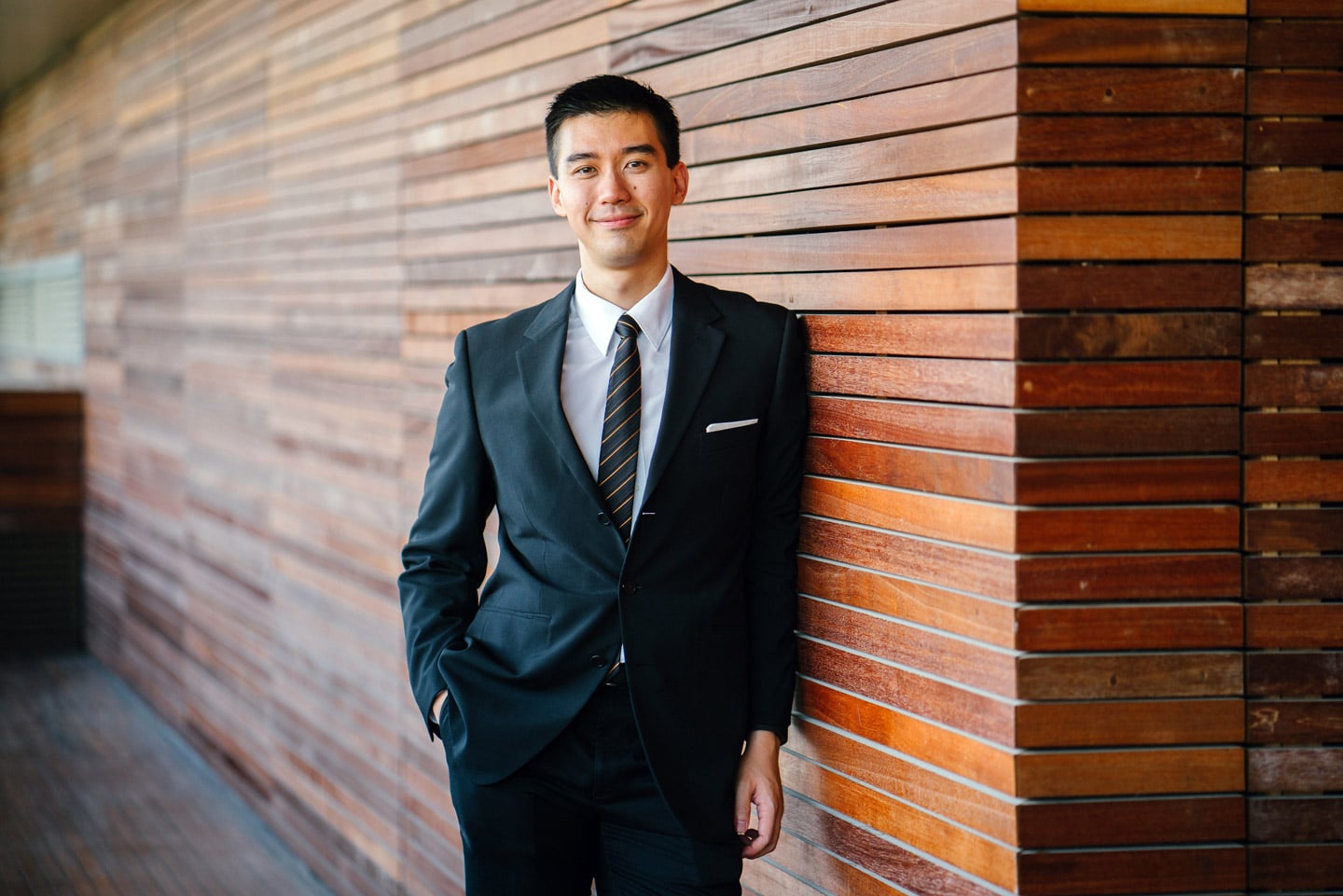 A businessman posing inside an office