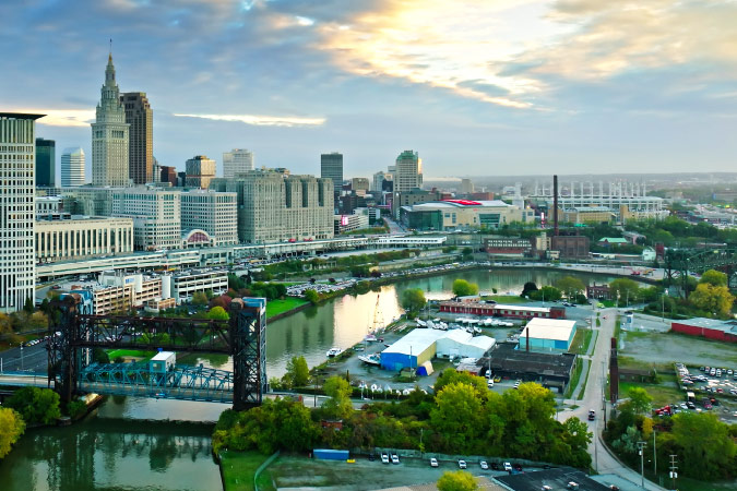 Aerial view of the Tremont neighborhood across the bridge from Downtown Cleveland, Ohio, during sunset. 