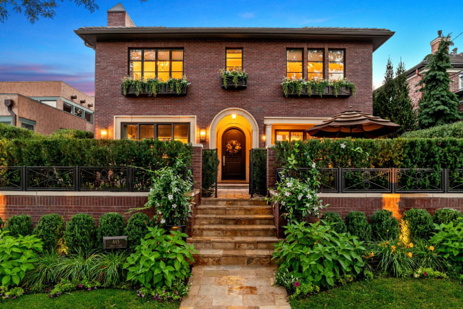 A stately two-story brick home in the Cherry Creek North neighborhood of Denver, Colorado.