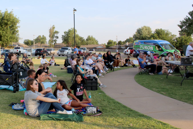 Locals gather for a concert in the park in Yukon, Oklahoma