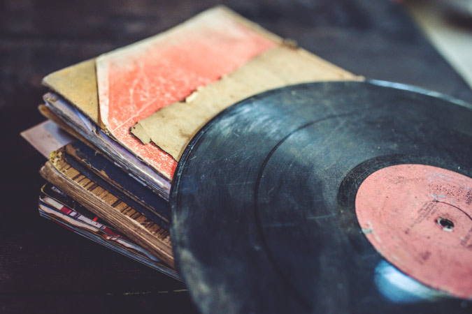  vinyl record is in bad condition after being stored carelessly, exposed to humidity and dust.