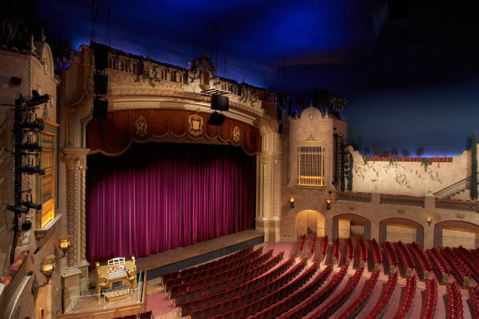 View from a balcony of the stage and floor seating in El Paso’s Plaza Theatre, conveniently located within minutes of the city’s Rim Area neighborhood.