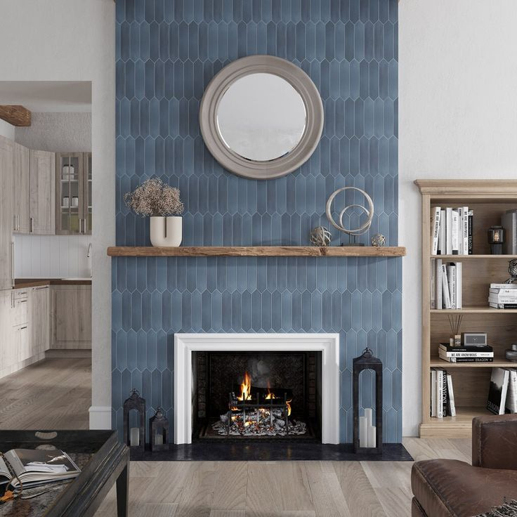 a fireplace sits in a blue coastal wall
