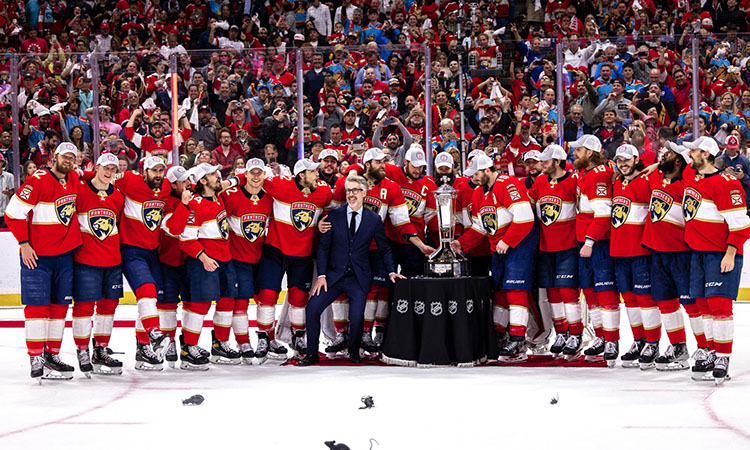 The 2022 Florida Panthers team on the ice with the Prince of Wales Trophy, which is rewarded to the winner of the Eastern Conference Finals series in the Stanley Cup Playoffs.