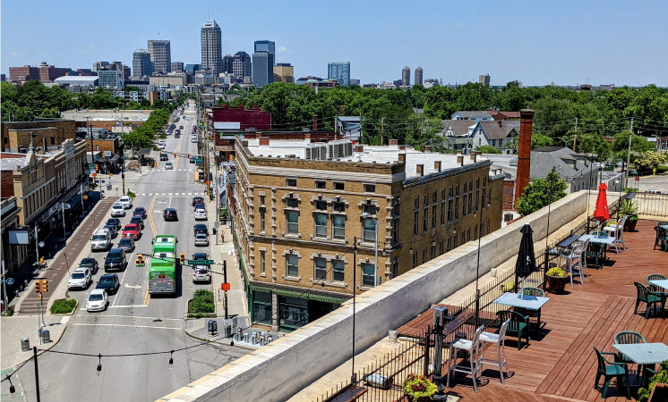 Distant view of Downtown Indianapolis from a rooftop garden on the Fountain Square Theatre Building in the historic Fountain Square neighborhood.