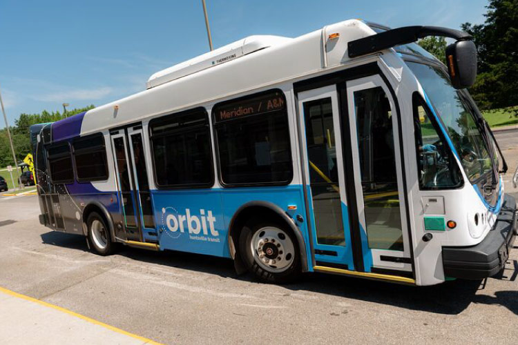 An Orbit city bus traveling through Huntsville, Alabama. 