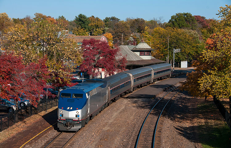 A passenger train departing the historic Kirkwood Station outside of St. Louis