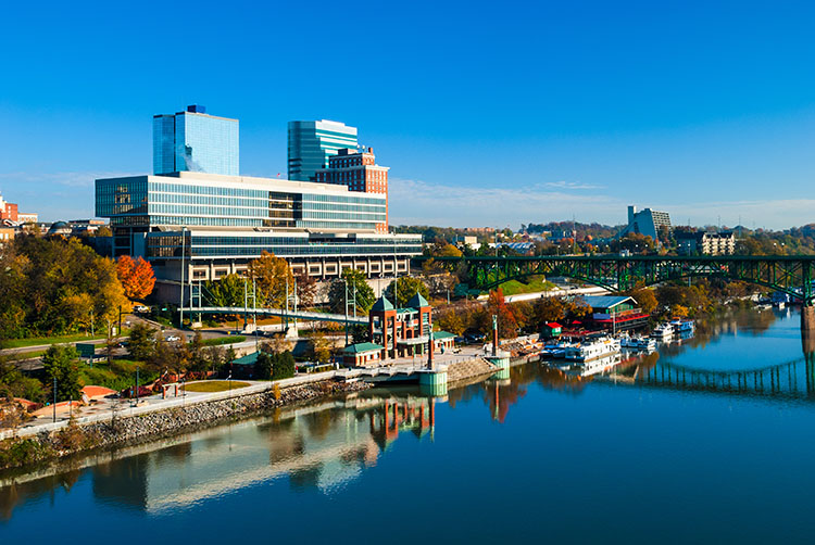 A sunny view of Knoxville, Tennessee, from across the Tennessee River.