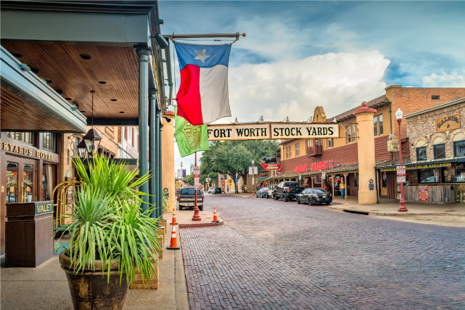 Empty sidewalks and streets on a hot day in the Fort Worth Stock Yards