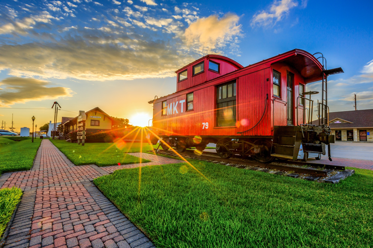 A view of the red caboose at the M-K-T Railroad Museum in Katy, Texas.