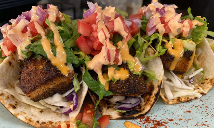 Close-up of blackened mahi tacos from Sea Salt Fish Market in Fort Lauderdale, Florida.