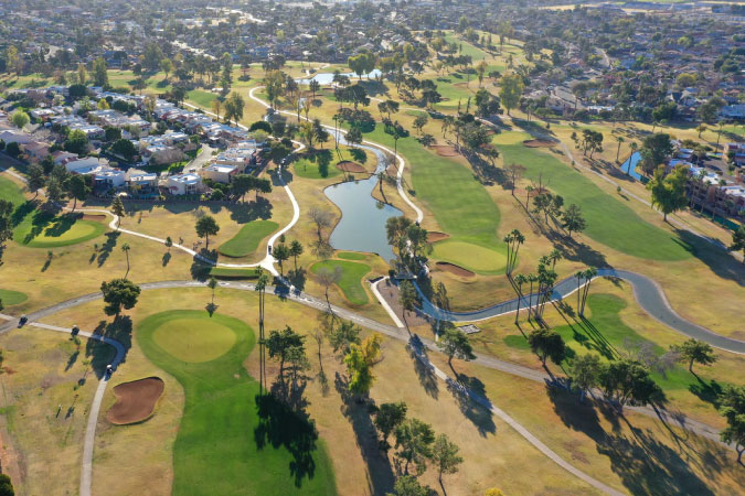 Aerial view of the Dobson Ranch Golf Course and surrounding Dobson Ranch neighborhood in Mesa, Arizona