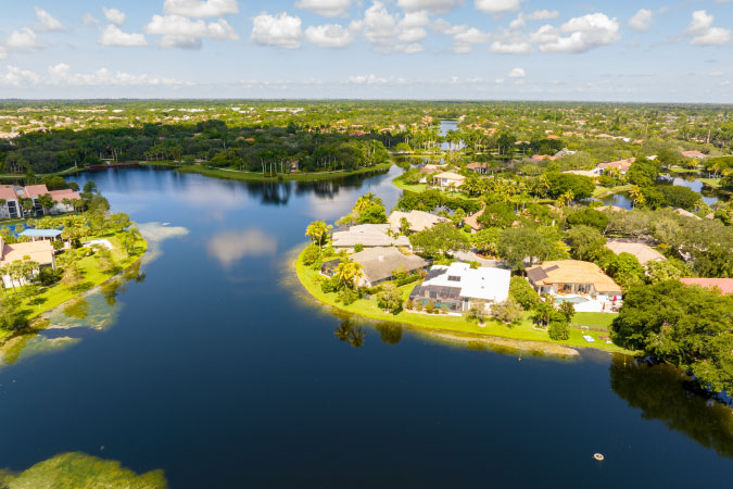Aerial view of luxury waterfront homes in the Miami suburb of Weston, Florida.
