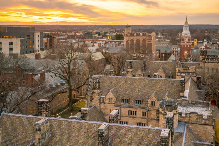 Rooftop view of New Haven, Connecticut, at sunset. The historic buildings are reminiscent of parts of London.