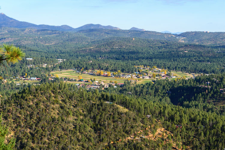 Distant view of the small New Mexico town, Ruidoso, and the surrounding Sierra Blanca mountain range. 