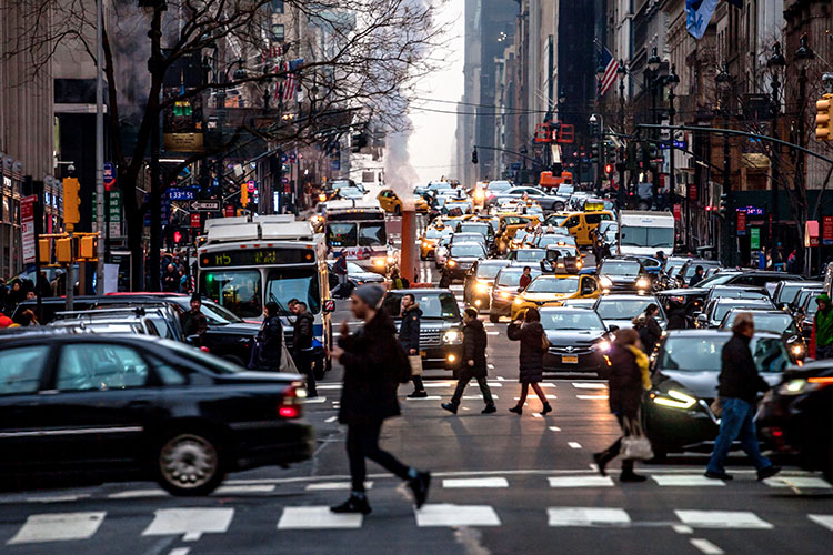 A noisy, busy New York street