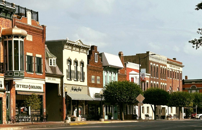 Several side-by-side brick storefronts in Pella, Iowa.
