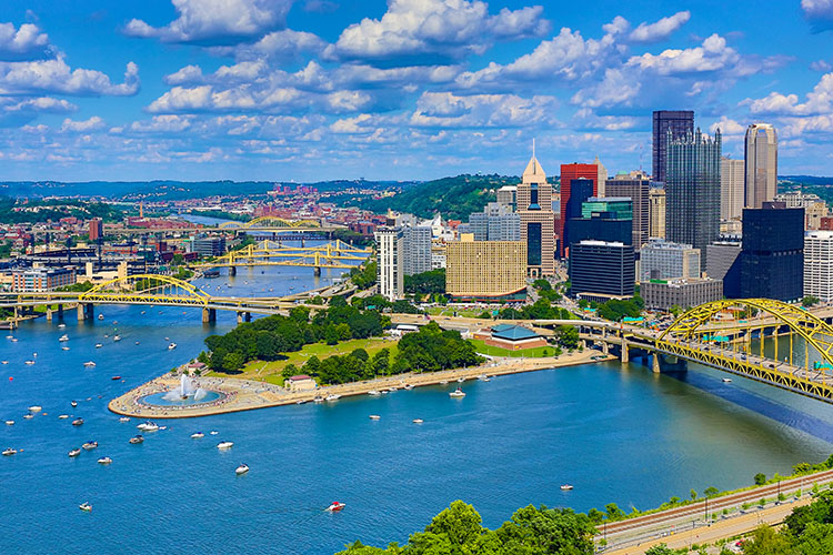 An aerial shot of Pittsburgh’s skyline and its many iconic bridges