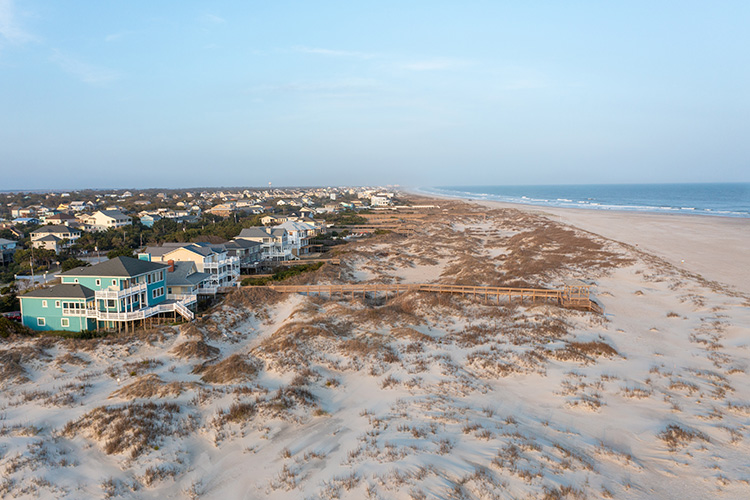 Emerald Isle, NC beach with homes on top of the dunes