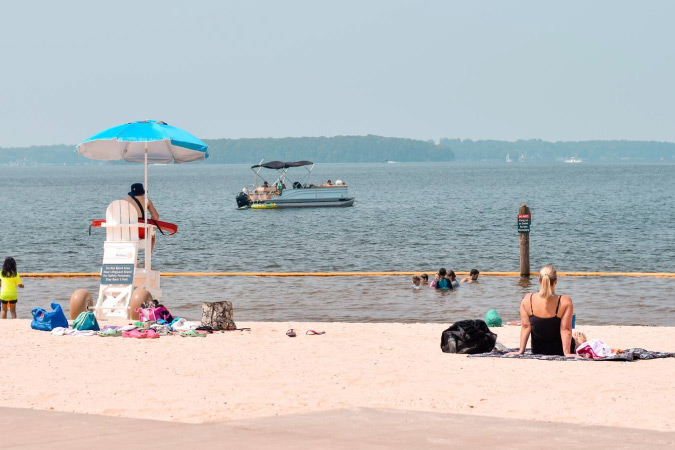 Locals lounge at Ramsey Creek beach off Lake Norman near Huntersville, NC