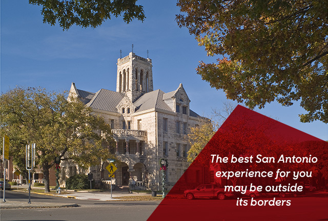 The courthouse in New Braunfels, Texas. Overlaid text reads, “The best San Antonio experience for you may be outside its borders”