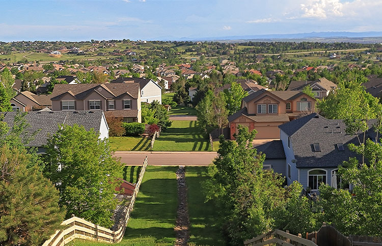 The Denver suburb Centennial. Two-story homes with large lawns line the streets. 