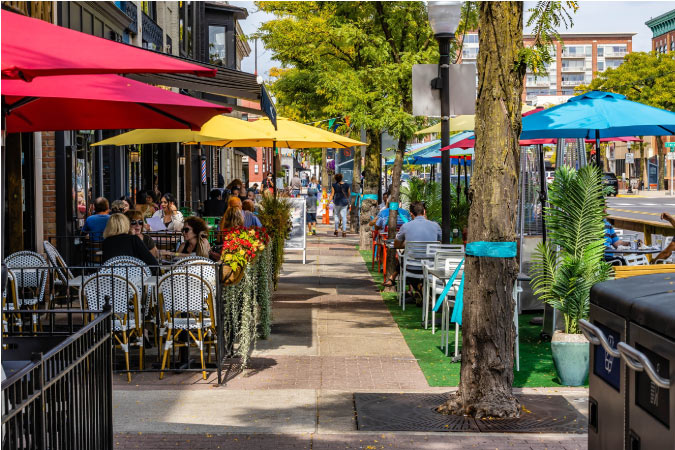  Locals dine al fresco in Downtown Royal Oak, Michigan, on a sunny day