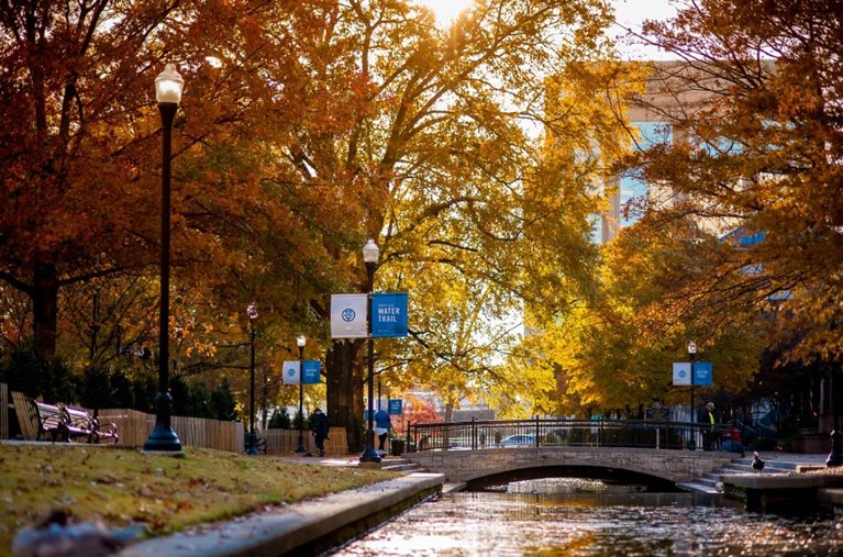An autumn scene in Huntsville, Alabama, along a canal in Big Spring Park.