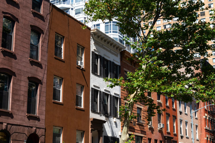A row of old residential buildings in the Kips Bay neighborhood of Manhattan, New York.