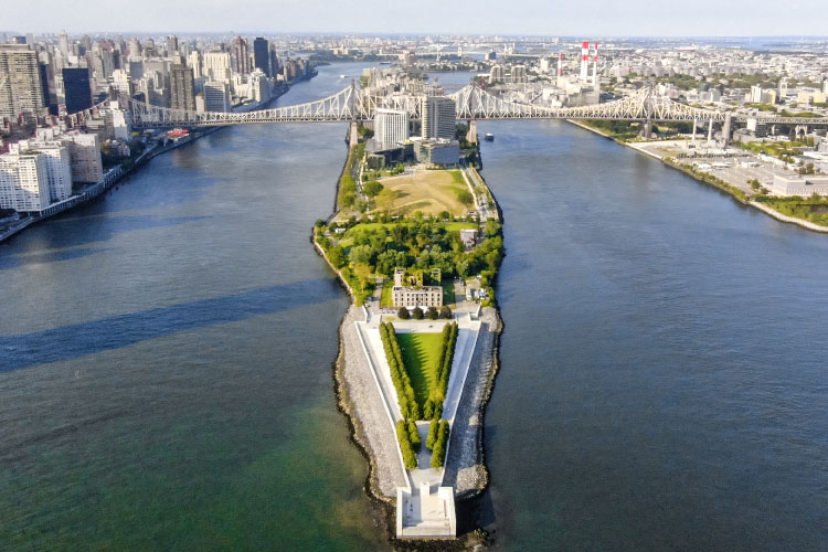 Aerial view of Roosevelt Island in New York City, on a sunny day.