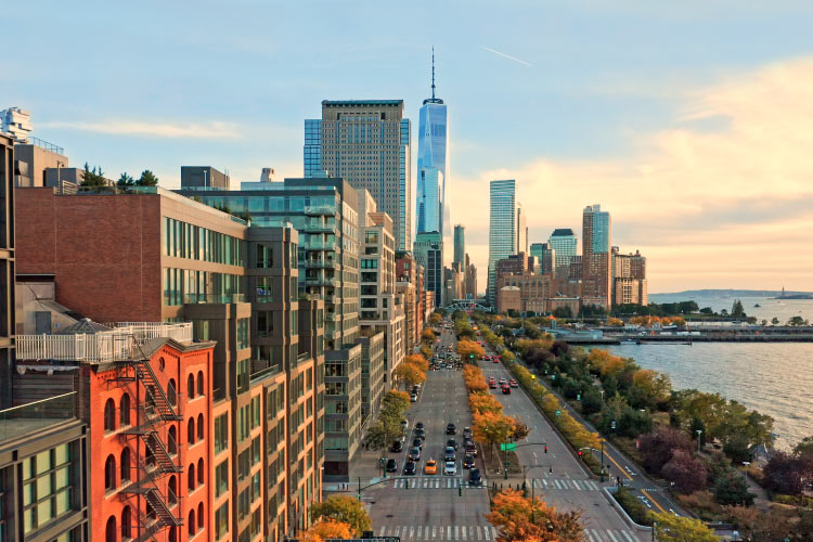 Aerial view of West Street in the Tribeca neighborhood of Manhattan during sunset.