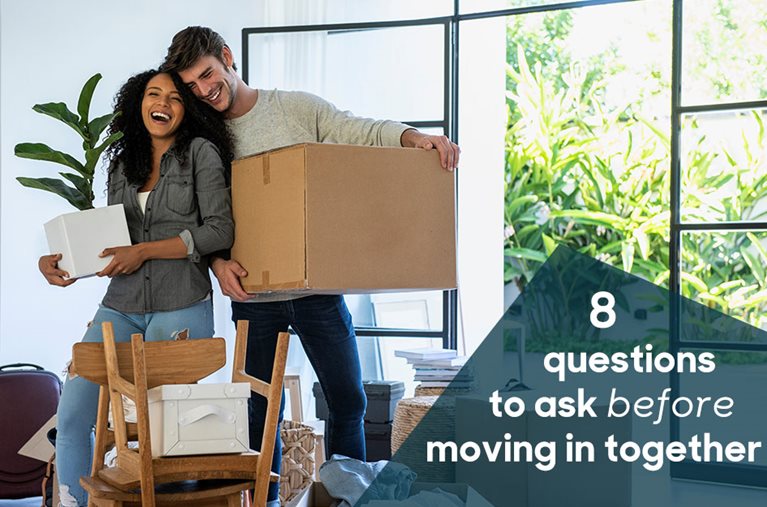 couple moving in together with moving boxes