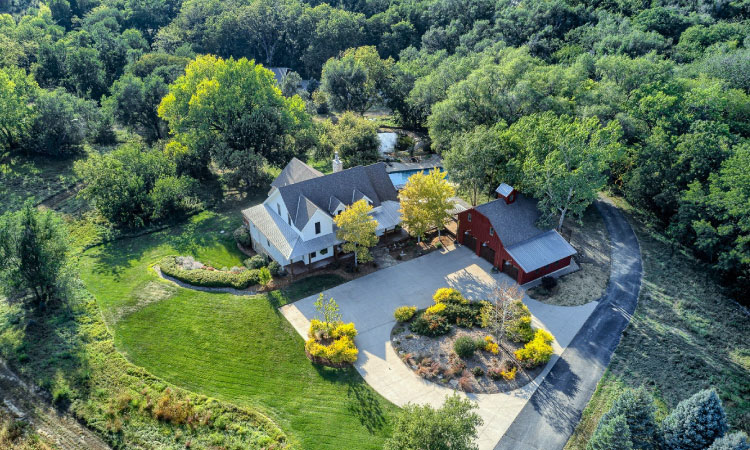 Aerial view of a beautiful country home on a large plot of land in Gretna, Nebraska.