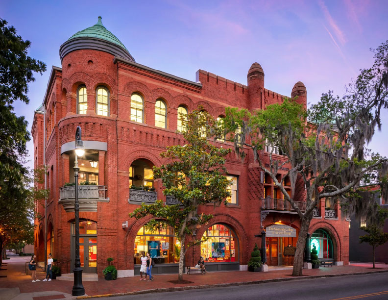 Exterior view of the Savannah College of Art and Design (SCAD) at dusk.