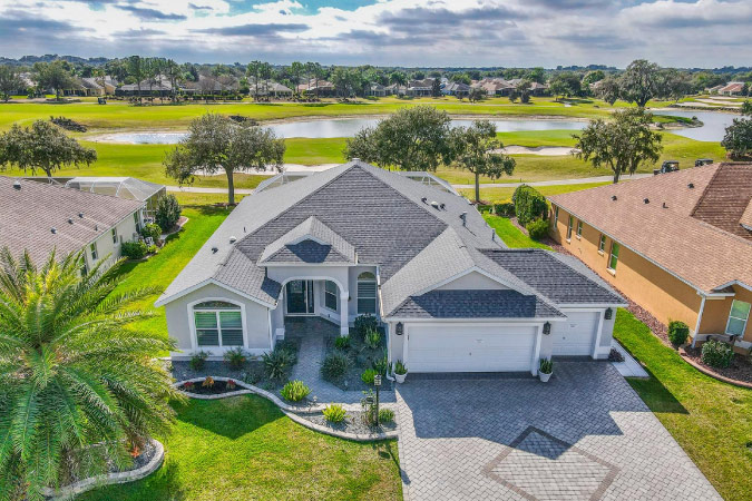 A large, single-story home in the Village of Bonnybrook, one of The Villages neighborhoods in Florida. 