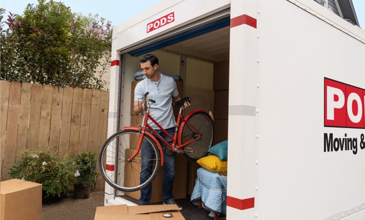 Personal items being moved out of a PODS moving and storage container