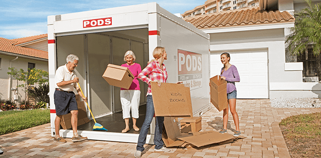 Mother and daughter unpacking